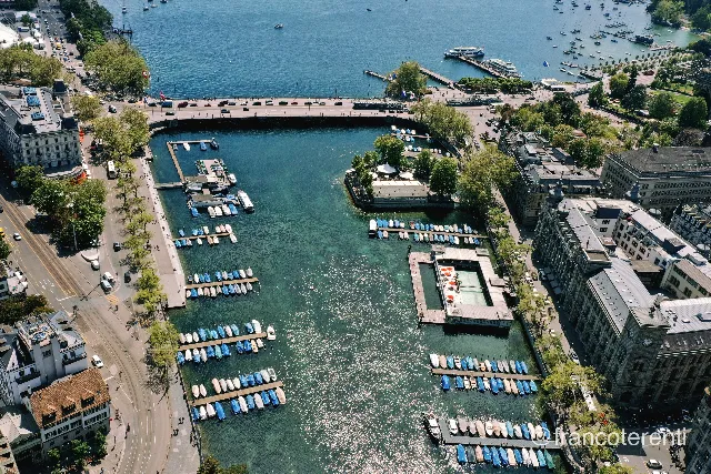 Aerial drone photograph over ZURICH, Switzerland from 47.366828575822076, 8.54315757751465 on 2024-05-10. Exposure 100 · f5.6 · 10mm.