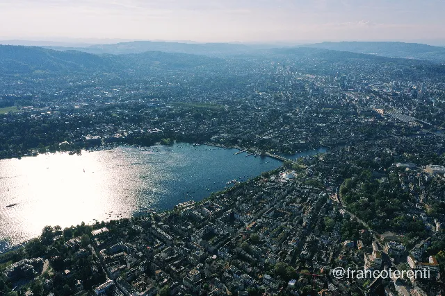Aerial drone photograph over ZURICH, Switzerland from 47.35778080535775, 8.537578582763674 on 2024-05-10. Exposure 100 · f6.3 · 10mm.
